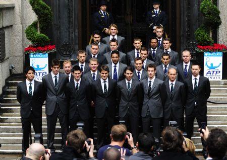 Participant players for singles and doubles pose for pictures in London, Nov. 20, 2009. They will take part in the ATP World Tour Finals which will be held from Nov. 22 to 29 in London. (Xinhua/Zeng Yi)