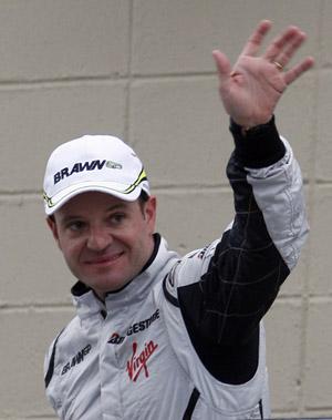 Brawn&nbsp;GP&nbsp;Formula&nbsp;One&nbsp;driver&nbsp;Rubens&nbsp;Barrichello&nbsp;of&nbsp;Brazil&nbsp;waves&nbsp;to&nbsp;the&nbsp;crowd&nbsp;after&nbsp;finishing&nbsp;the&nbsp;qualifying&nbsp;session&nbsp;with&nbsp;the&nbsp;best&nbsp;time&nbsp;to&nbsp;take&nbsp;the&nbsp;pole&nbsp;position&nbsp;at&nbsp;the&nbsp;Interlagos&nbsp;racetrack&nbsp;in&nbsp;Sao&nbsp;Paulo&nbsp;October&nbsp;17,&nbsp;2009.&nbsp;(Xinhua/Reuters,&nbsp;File&nbsp;Photo)