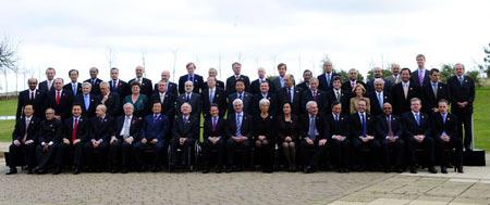 Representatives&nbsp;pose&nbsp;for&nbsp;a&nbsp;group&nbsp;photo&nbsp;after&nbsp;the&nbsp;G20&nbsp;Finance&nbsp;Minister&nbsp;and&nbsp;Central&nbsp;Bank&nbsp;Governor&nbsp;Meeting&nbsp;in&nbsp;St.&nbsp;Andrews,&nbsp;Britain,&nbsp;Nov.&nbsp;7,&nbsp;2009.(Xinhua/Zeng&nbsp;Yi)
