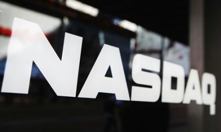 A&nbsp;sign&nbsp;for&nbsp;the&nbsp;NASDAQ&nbsp;Market&nbsp;site&nbsp;is&nbsp;seen&nbsp;in&nbsp;New&nbsp;York's&nbsp;Times&nbsp;Square,&nbsp;Feb.&nbsp;8,&nbsp;2010.&nbsp;The&nbsp;trans-Atlantic&nbsp;exchange&nbsp;operator&nbsp;reported&nbsp;a&nbsp;lower&nbsp;fourth&nbsp;quarter&nbsp;profit&nbsp;before&nbsp;one-time&nbsp;items,&nbsp;hurt&nbsp;by&nbsp;sluggish&nbsp;trading&nbsp;and&nbsp;lower&nbsp;market&nbsp;share&nbsp;compared&nbsp;to&nbsp;a&nbsp;year&nbsp;ago.&nbsp;(Xinhua/Reuters&nbsp;Photo)