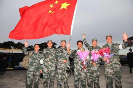 Members&nbsp;of&nbsp;the&nbsp;Chinese&nbsp;medical&nbsp;team&nbsp;pose&nbsp;for&nbsp;a&nbsp;group&nbsp;photo&nbsp;at&nbsp;Beijing&nbsp;Capital&nbsp;International&nbsp;Airport&nbsp;in&nbsp;Beijing,&nbsp;capital&nbsp;of&nbsp;China,&nbsp;Feb.&nbsp;10,&nbsp;2010.&nbsp;The&nbsp;Chinese&nbsp;medical&nbsp;team&nbsp;arrived&nbsp;in&nbsp;Beijing&nbsp;on&nbsp;Wednesday&nbsp;morning&nbsp;after&nbsp;winding&nbsp;up&nbsp;a&nbsp;two-week&nbsp;emergency&nbsp;aid&nbsp;and&nbsp;epidemic&nbsp;control&nbsp;mission&nbsp;in&nbsp;the&nbsp;quake-stricken&nbsp;Haiti.&nbsp;(Xinhua/Li&nbsp;Gang)&nbsp;