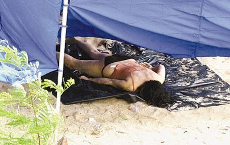 香港一女子遭割喉 半裸伏尸海滩(图)_粤语台