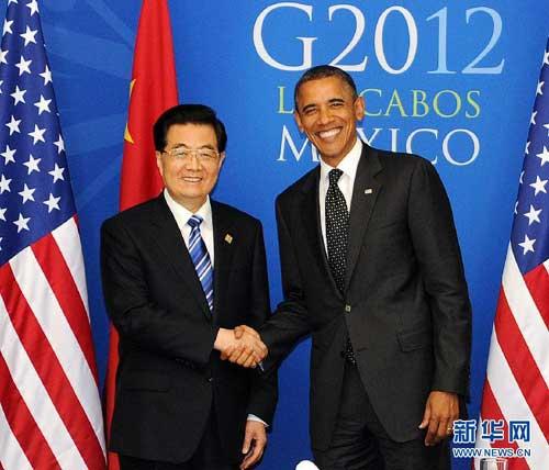 Chinese President Hu Jintao met his U.S. counterpart Barack Obama Tuesday in Los Cabos, Mexico.