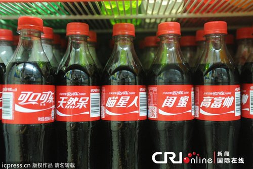 可口可乐换包装卖萌 迎合中国市场