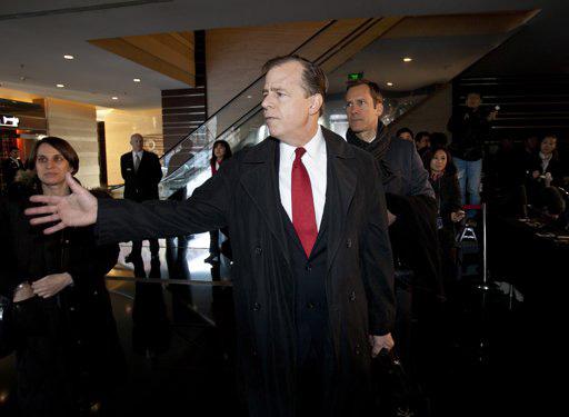 U.S. envoy on North Korean Affairs Glyn Davies, center, speaks to embassy staff, before heading to the nuclear talk between the US and North Korea, at a hotel in Beijing, China, Thursday, Feb. 23, 2012.
