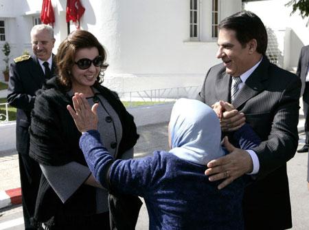 Tunisian&nbsp;President&nbsp;Zine&nbsp;al-Abidine&nbsp;Ben&nbsp;Ali&nbsp;and&nbsp;his&nbsp;wife&nbsp;Leila&nbsp;(L)&nbsp;greet&nbsp;a&nbsp;woman&nbsp;as&nbsp;they&nbsp;arrive&nbsp;to&nbsp;cast&nbsp;their&nbsp;ballots&nbsp;in&nbsp;Tunis&nbsp;October&nbsp;25,&nbsp;2009.(Xinhua/AFP&nbsp;Photo)