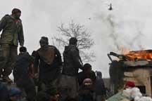 Afghans protest Koran disposal at US base