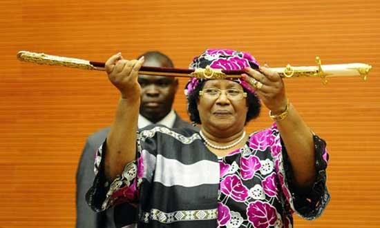 Joyce Banda holds a ceremonial sword at her inauguration on April 7, 2012 as Malawi's new president, becoming its first female leader in a ceremony in the capital Lilongwe.