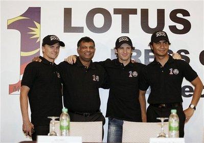 Formula&nbsp;One&nbsp;drivers&nbsp;Italy's&nbsp;Jarno&nbsp;Trulli,&nbsp;second&nbsp;right,&nbsp;Finland's&nbsp;Heikki&nbsp;Kovalainen,&nbsp;left,&nbsp;and&nbsp;Malaysia's&nbsp;Fairuz&nbsp;Fauzy,&nbsp;right,&nbsp;are&nbsp;pictured&nbsp;with&nbsp;Lotus&nbsp;F1&nbsp;racing&nbsp;team&nbsp;principal&nbsp;Tony&nbsp;Fernandes&nbsp;at&nbsp;a&nbsp;press&nbsp;conference&nbsp;in&nbsp;Kuala&nbsp;Lumpur,&nbsp;Malaysia,&nbsp;Monday,&nbsp;Dec.&nbsp;14,&nbsp;2009.&nbsp;Trulli,&nbsp;Kovalainen&nbsp;and&nbsp;Fauzy&nbsp;will&nbsp;race&nbsp;for&nbsp;Lotus&nbsp;when&nbsp;the&nbsp;Malaysian-backed&nbsp;Formula&nbsp;One&nbsp;team&nbsp;returns&nbsp;to&nbsp;the&nbsp;starting&nbsp;grid&nbsp;next&nbsp;season.(AP&nbsp;Photo/Mark&nbsp;Baker)