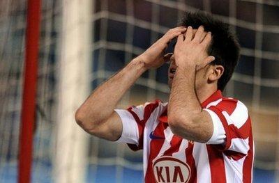 Atletico Madrid's midfielder Jose Manuel Jurado reacts after missing an opportunity during a Spanish League football match against Xerez at Vicente Calderon stadium in Madrid . Xerez won 2-1.(AFP/Javier Soriano)