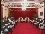 老挝人民革命党总书记国家主席会见梁光烈