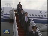 李长春抵达达卡开始访问孟加拉国