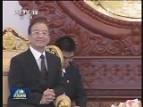 温家宝会见老挝人民革命党总书记、国家主席
