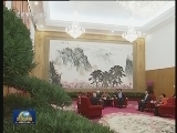 习近平会见美国前总统卡特