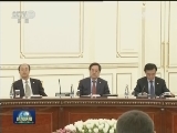习近平同乌兹别克斯坦总统举行会谈 两国元首一致决定建立中乌全面战略伙伴关系