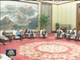 栗战书会见德国总理