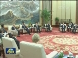 栗战书会见法国总理