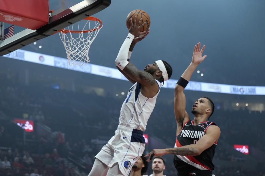 东契奇36+13西蒙斯空砍27分 独行侠胜开拓者