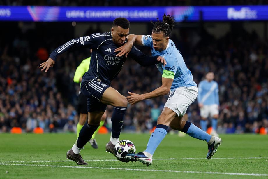 维尼修斯双响B席送点 皇马总分5-1曼城进八强