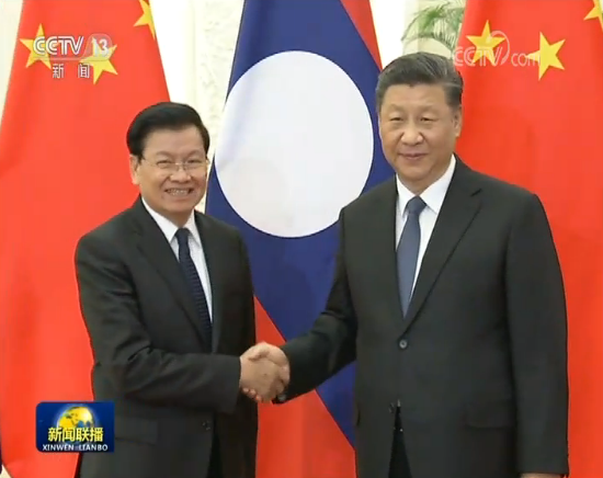习近平会见老挝总理
