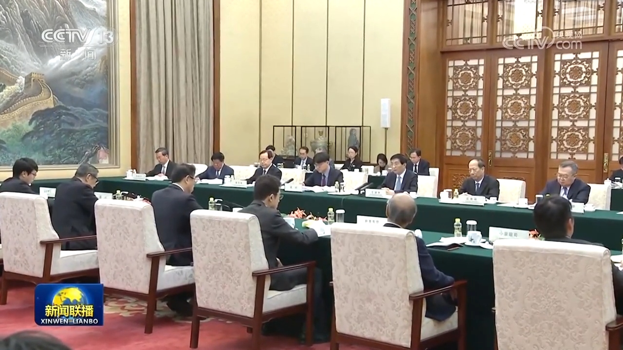 王沪宁会见日本执政党代表团