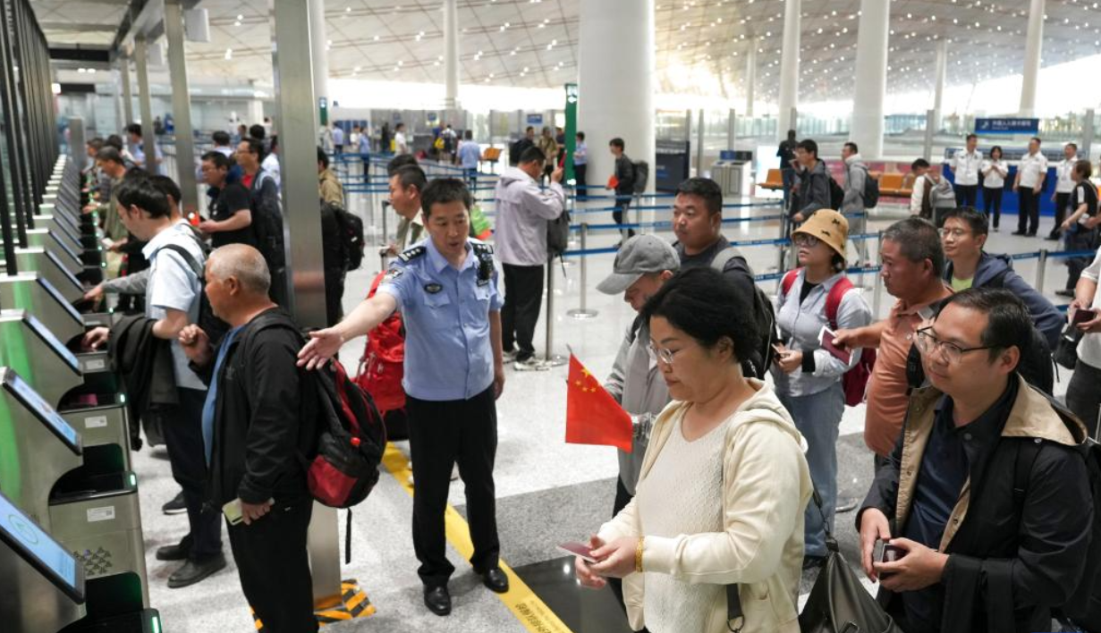 Chinese nationals evacuated from Iran arrive in Beijing