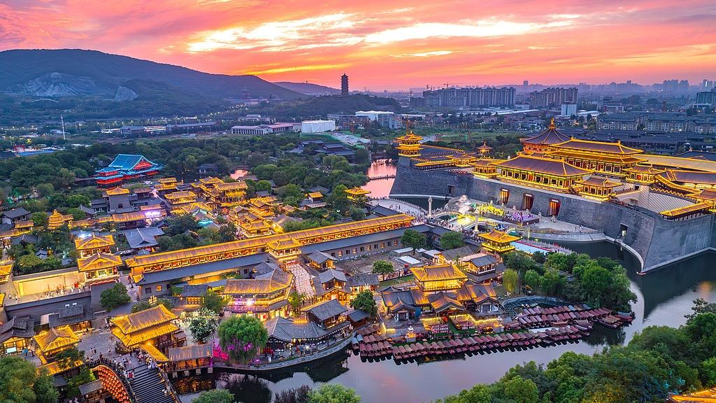 Tangcheng’s dazzling nightscape meets the sunset