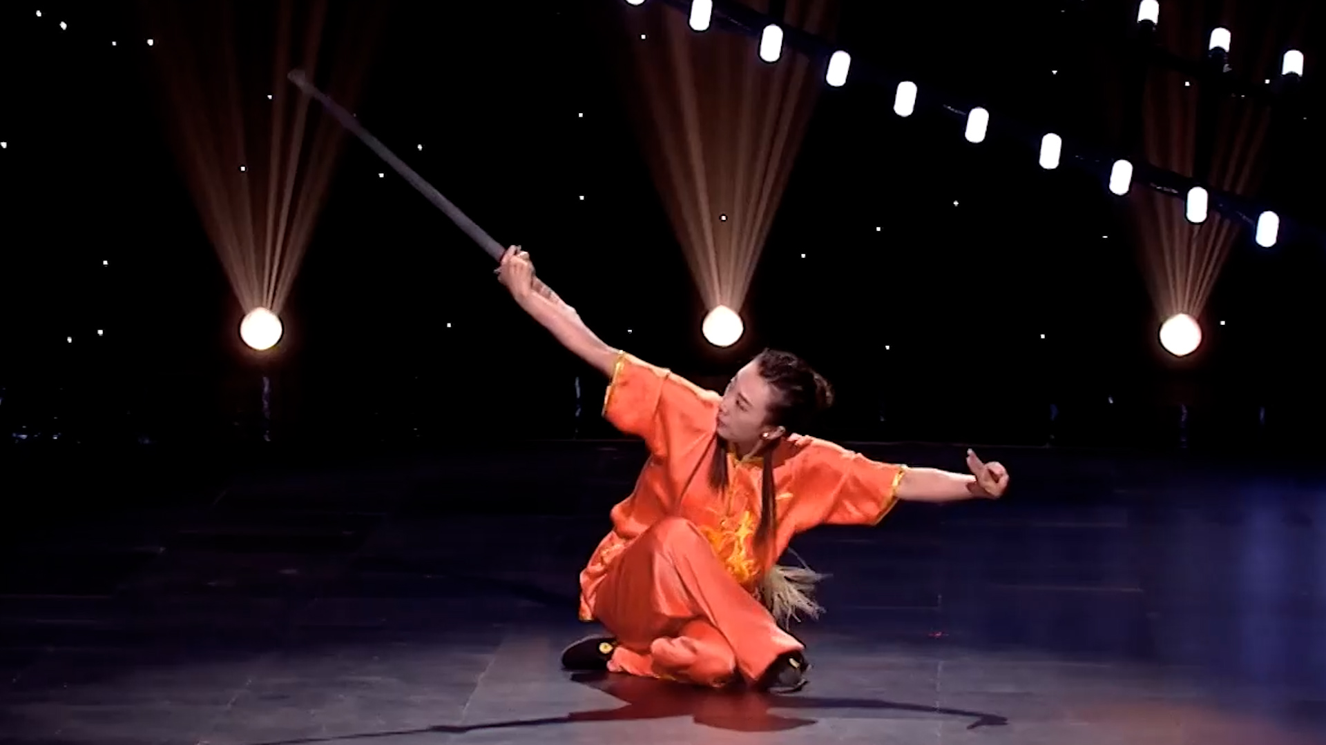 Chinese martial artist performs Tai Chi Long Tassel Sword