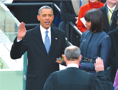 新华社发美国连任总统奥巴马21日在华盛顿国会山举行的公众就职典礼上