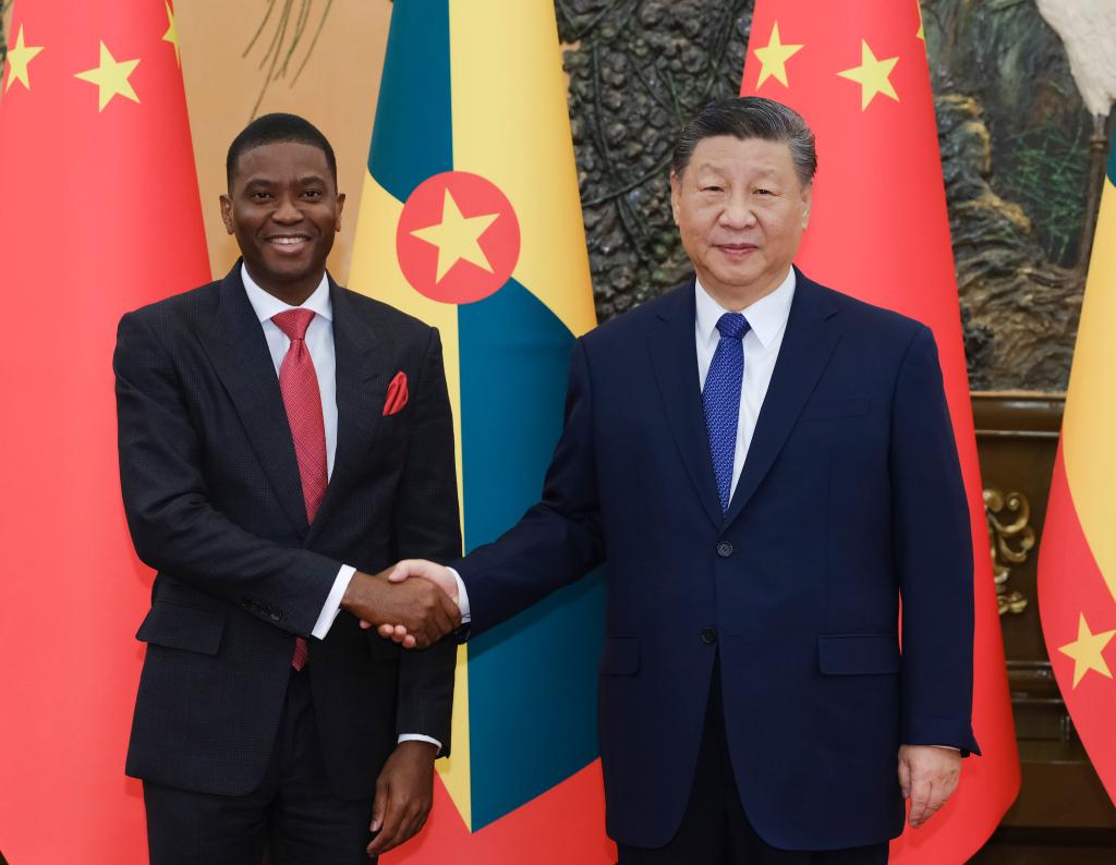 Chinese President Xi Jinping meets with Prime Minister of Grenada Dickon Mitchell, who is on an official visit to China, at the Great Hall of the People in Beijing, capital of China, Jan. 13, 2025. 