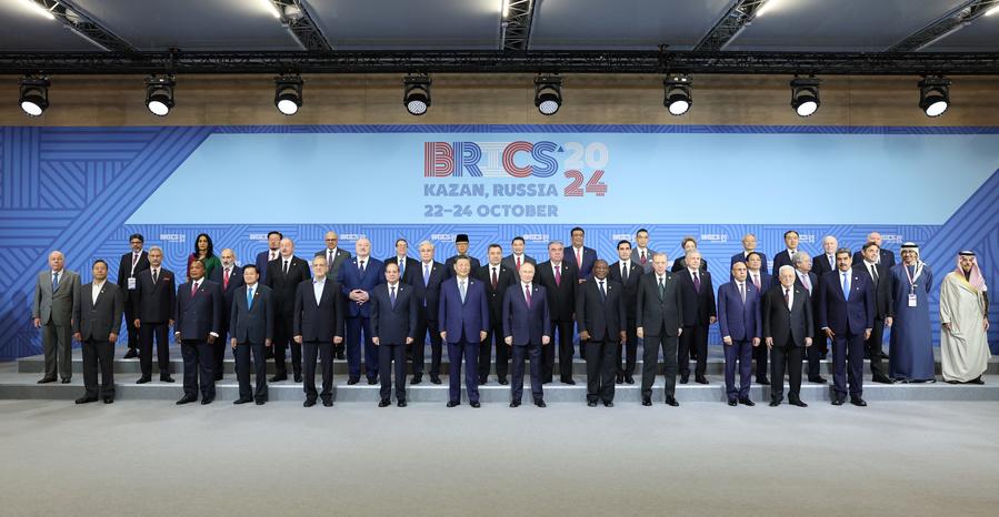 Chinese President Xi Jinping poses for a group photo with other leaders and representatives attending the "BRICS Plus" Dialogue in Kazan, Russia, Oct. 24, 2024. (Xinhua/Yao Dawei)