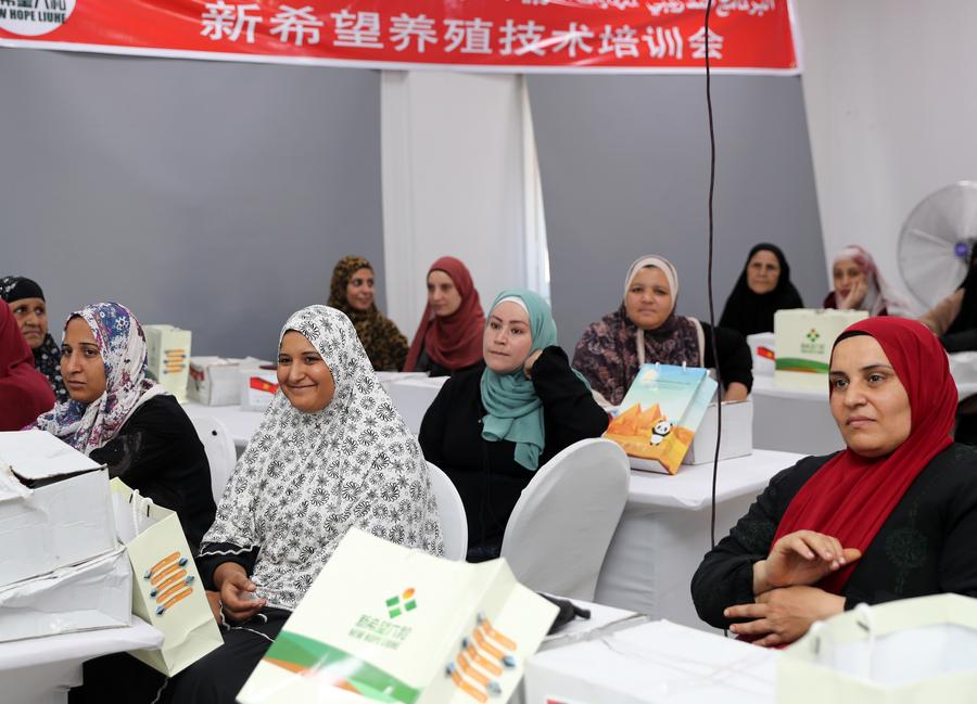 Women take a poultry farming training class after the launch ceremony of a poultry farming training program in Menoufia Governorate, Egypt, on Aug. 11, 2025. (Xinhua/Sui Xiankai)